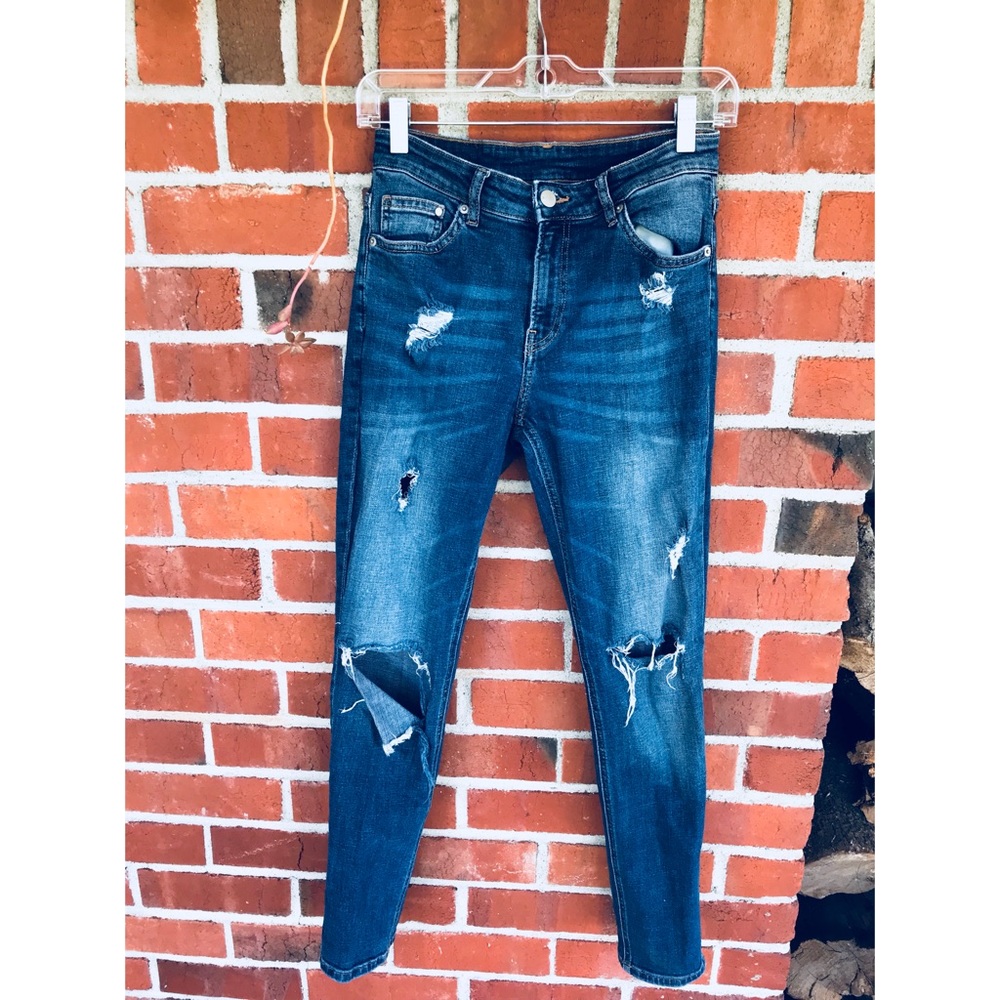 Ripped blue jeans